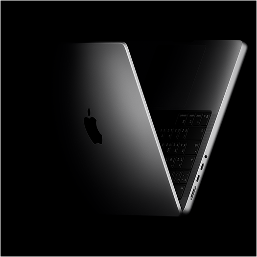 MacBook Pro ที่วางในรูปทรงตัว V ซึ่งอ้างอิงจากชิปตระกูล M5